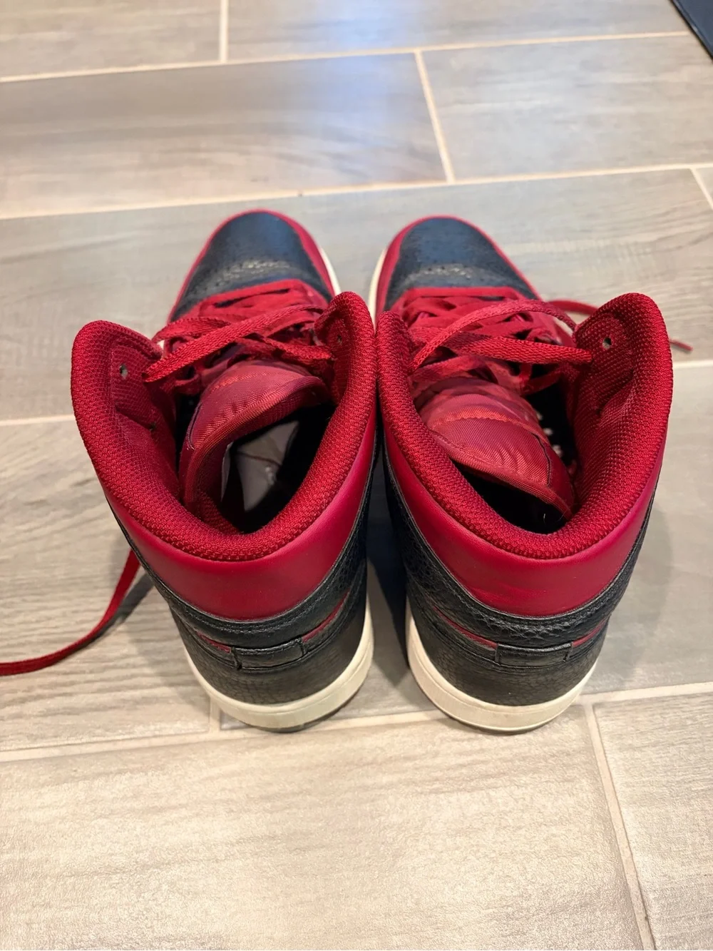 Nike Jordan Red and Black Mid-Top Sneakers